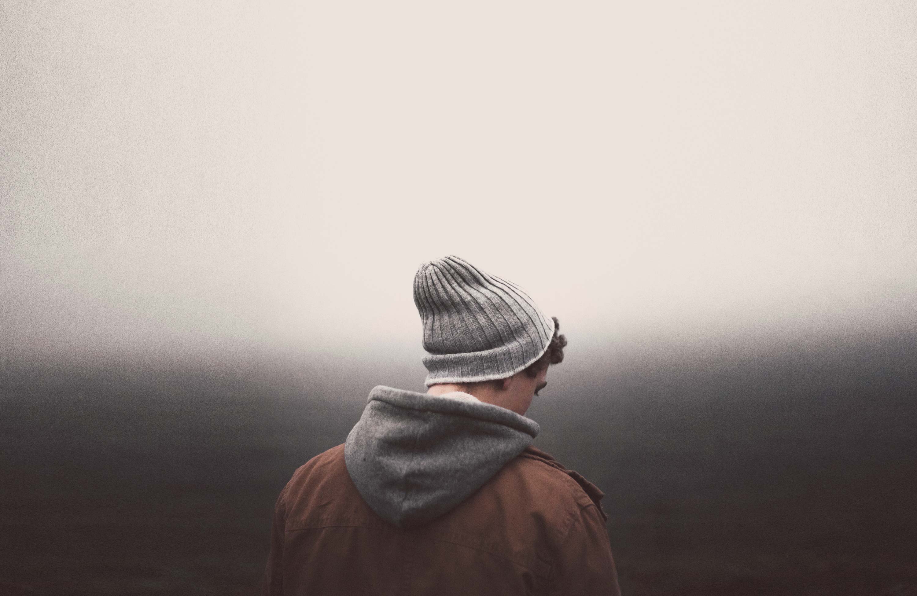 Young man looking down